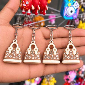87 এক পিছ Handbag Keychain – Stylish & Cute